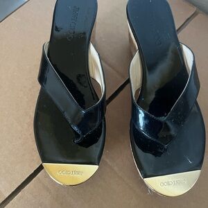 Jimmy Choo Black and Gold Platform Sandals